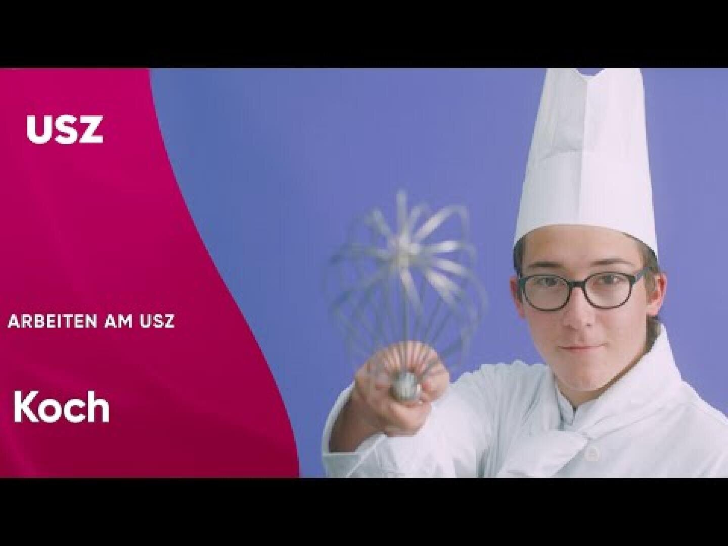Ein Koch in weißer Uniform und großer Mütze hält einen Schneebesen in die Kamera. Der Hintergrund ist violett, und auf der linken Seite steht geschrieben: USZ, ARBEITEN AM USZ, Koch.